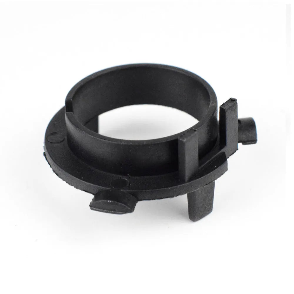 Black ABS plastic card holder for car LED headlight, shown next to a parking card.