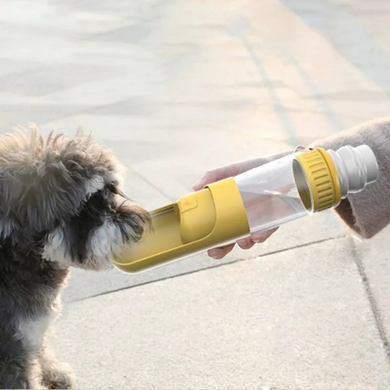 Portable dog water bottle with built-in drinking bowl in dark blue, white or yellow colours