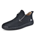 Men's black leather zip-up boots with hand-stitched detailing and round toe