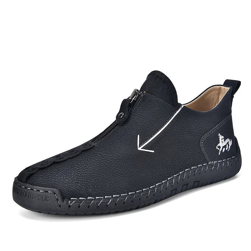 Men's black leather zip-up boots with hand-stitched detailing and round toe