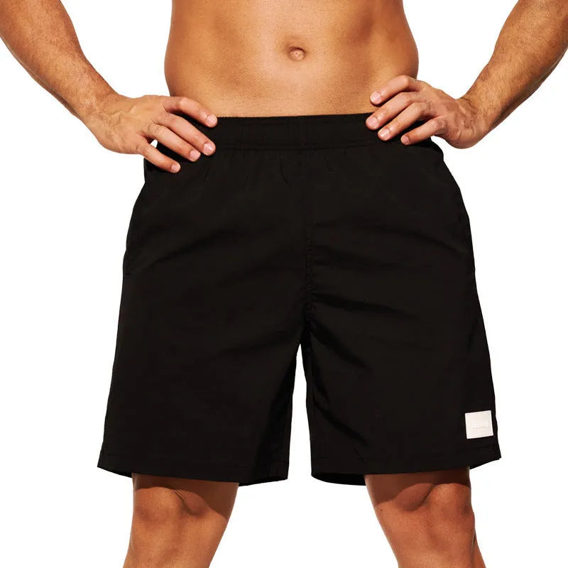 Men's quick-drying nylon sports shorts in straight leg style available in multiple colours