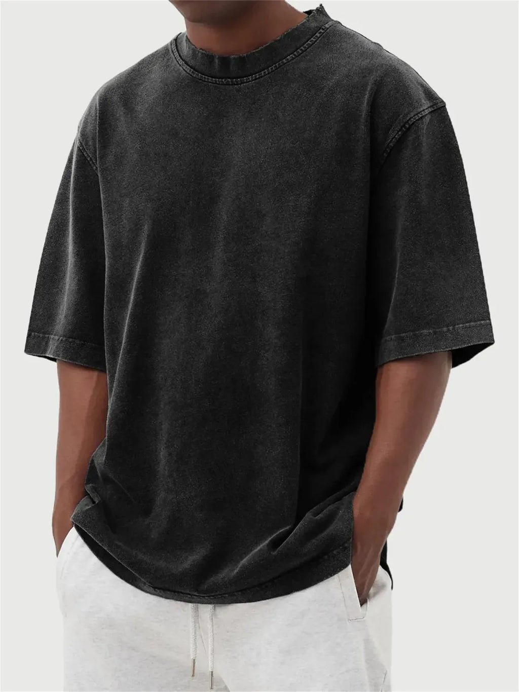 Men's distressed stone wash pullover T-shirt in loose fit with half sleeves available in multiple solid colours