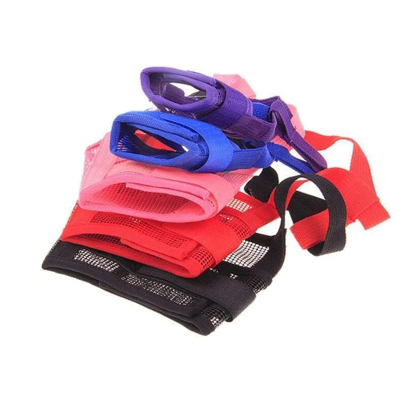 Adjustable plastic dog muzzle in assorted colours on a size chart showing measurements from 12cm to 34cm.