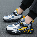 Boys' dark blue and black sports running shoes with velcro strap and mesh upper.