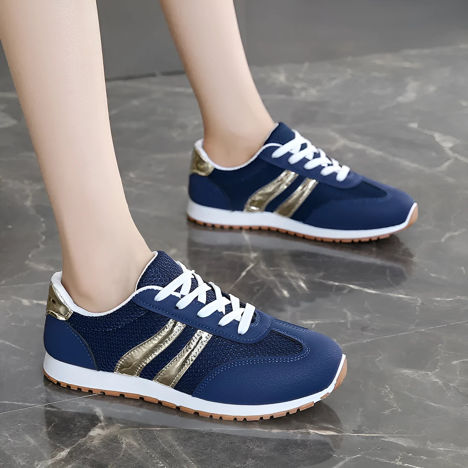 Light blue women's tennis shoes with cross shoulder straps and white rubber soles