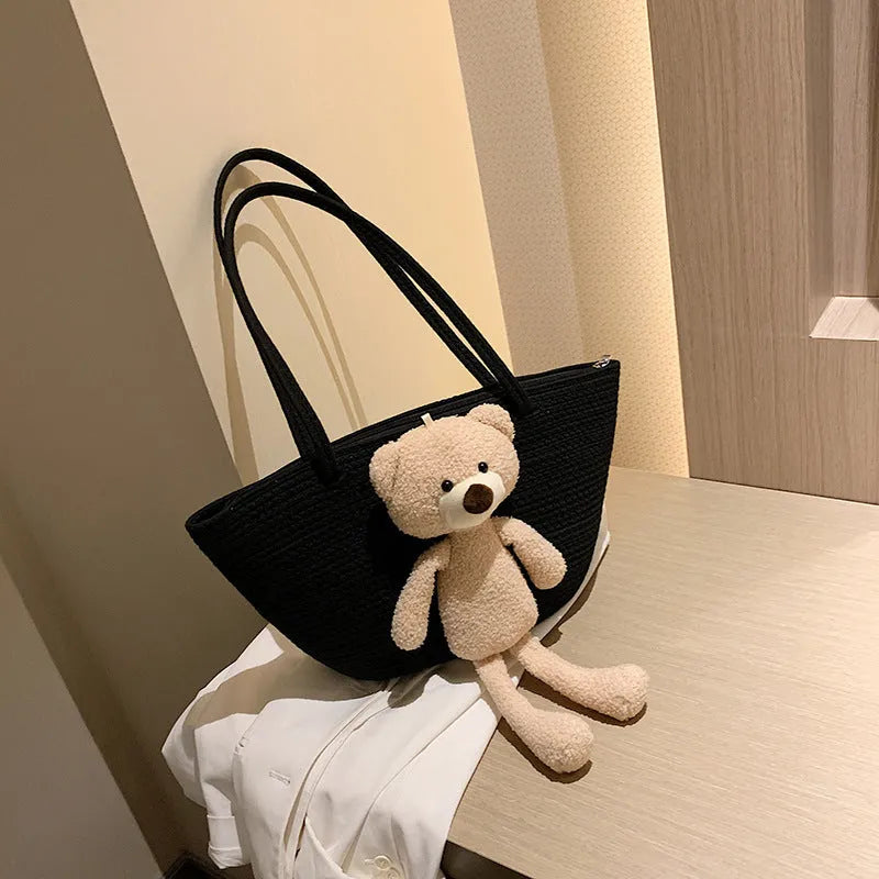 Cotton and linen woven shoulder bag with dumpling shape and double straps in multiple colours