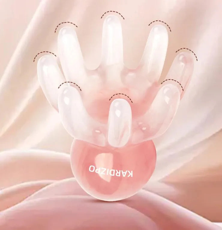 Small pink octopus-shaped natural resin massage comb with storage bag.