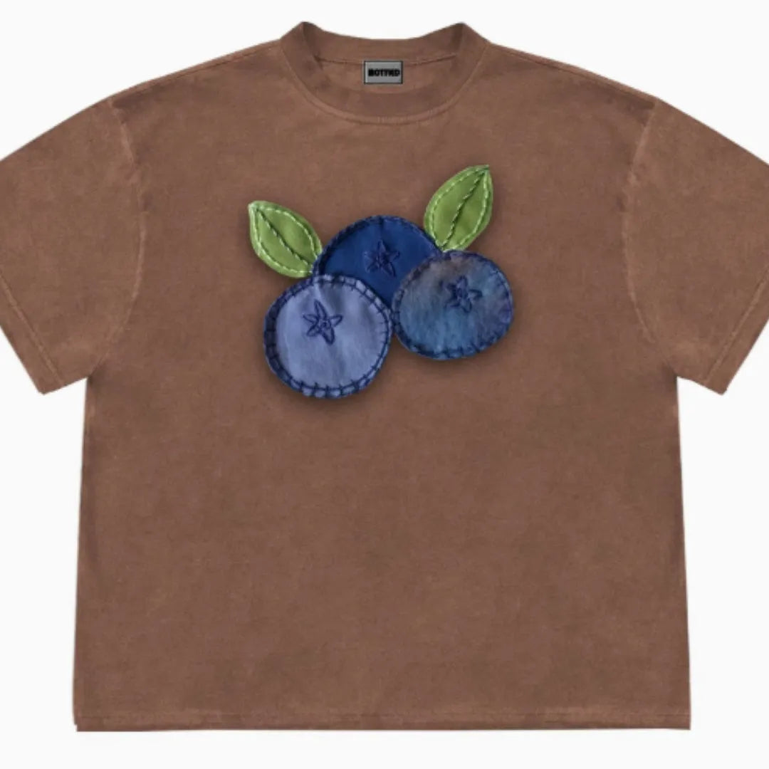 Women's loose blueberry patchwork T-shirt with short sleeves and floral design on Ice Oxygen cotton.