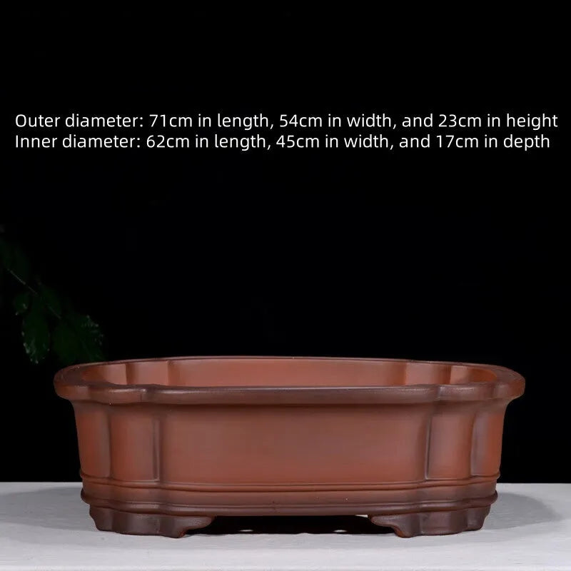 Antique jade Chinese style purple clay flowerpot with golden marble patterning, oval shape, 71cm long.