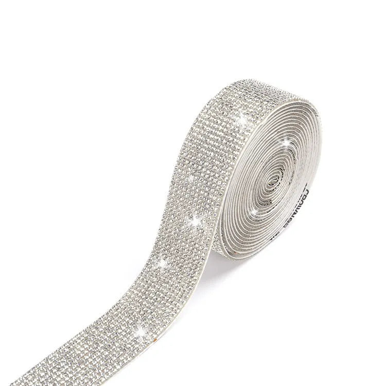 Self-adhesive glass water drill strip on a one-yard reel for shoe and clothing decoration.