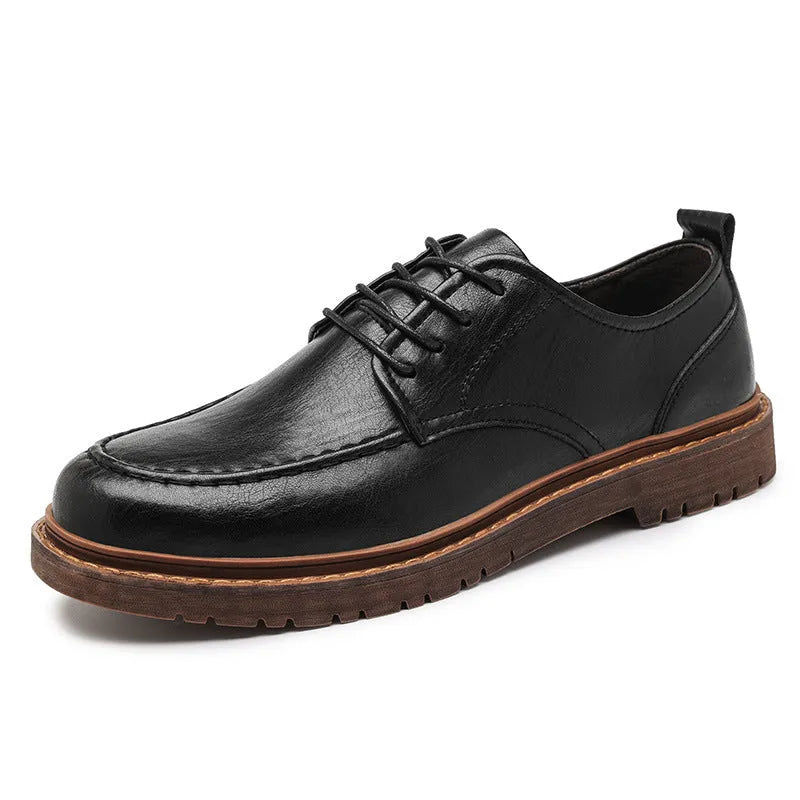 Men's black and brown casual leather shoes with round toe, low top, and flat rubber sole