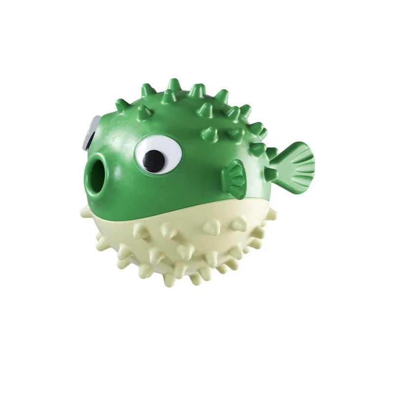 Green fish-shaped dog toy with textured surface for dental cleaning and treat dispensing