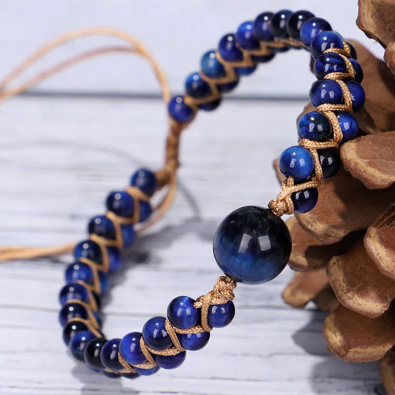 Handwoven geometric pull bracelet in blue tiger eye stone beads with adjustable closure