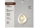 Sili Style modern pendant light with milky white glass shade in a dining room setting.
