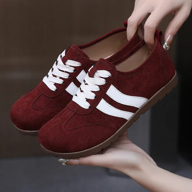 Women's vintage canvas sneakers with round toe and flat heel in dark red colour