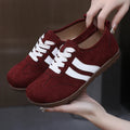 Women's vintage canvas sneakers with round toe and flat heel in dark red colour