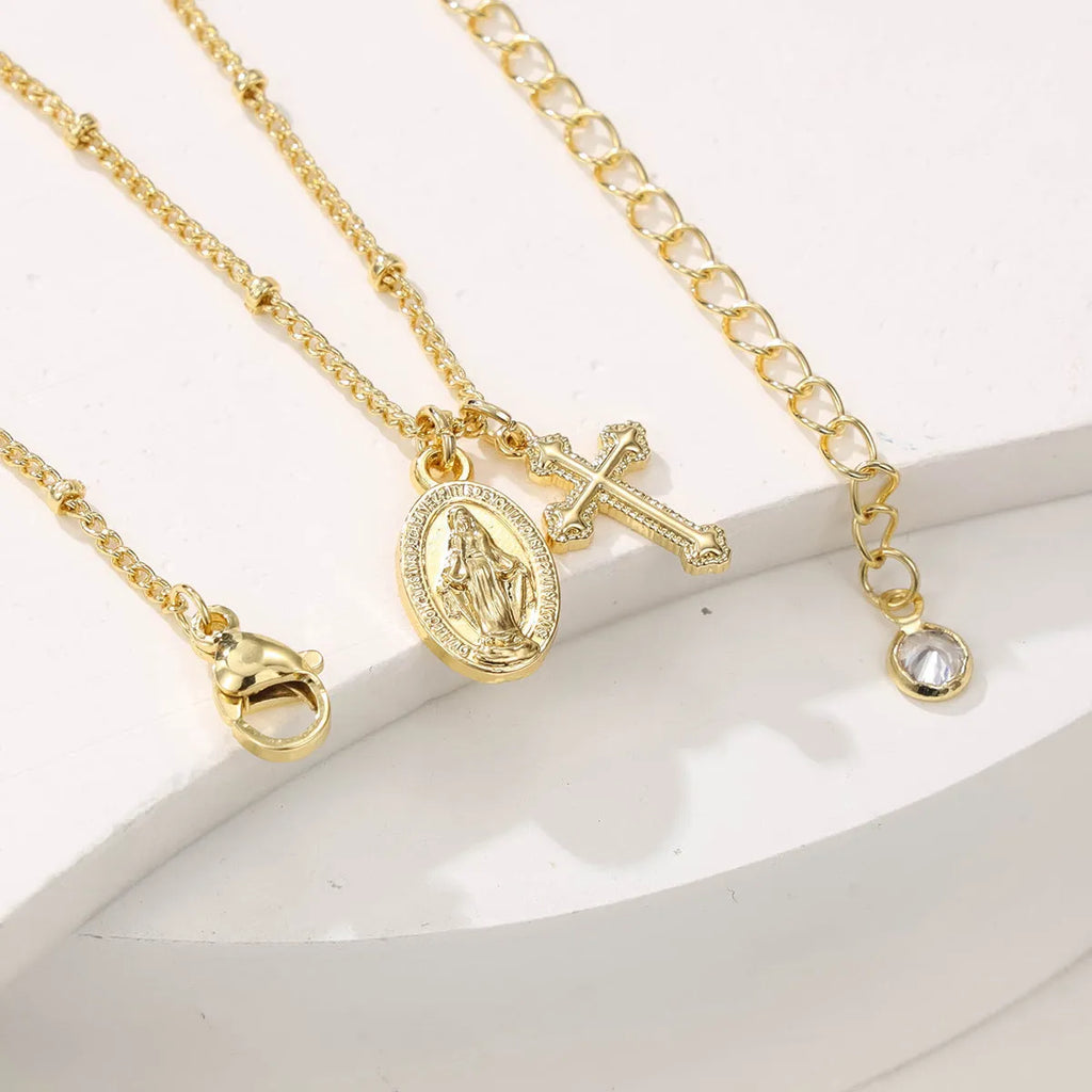 Gold Virgin Mary and cross geometric pendant necklace on a chain