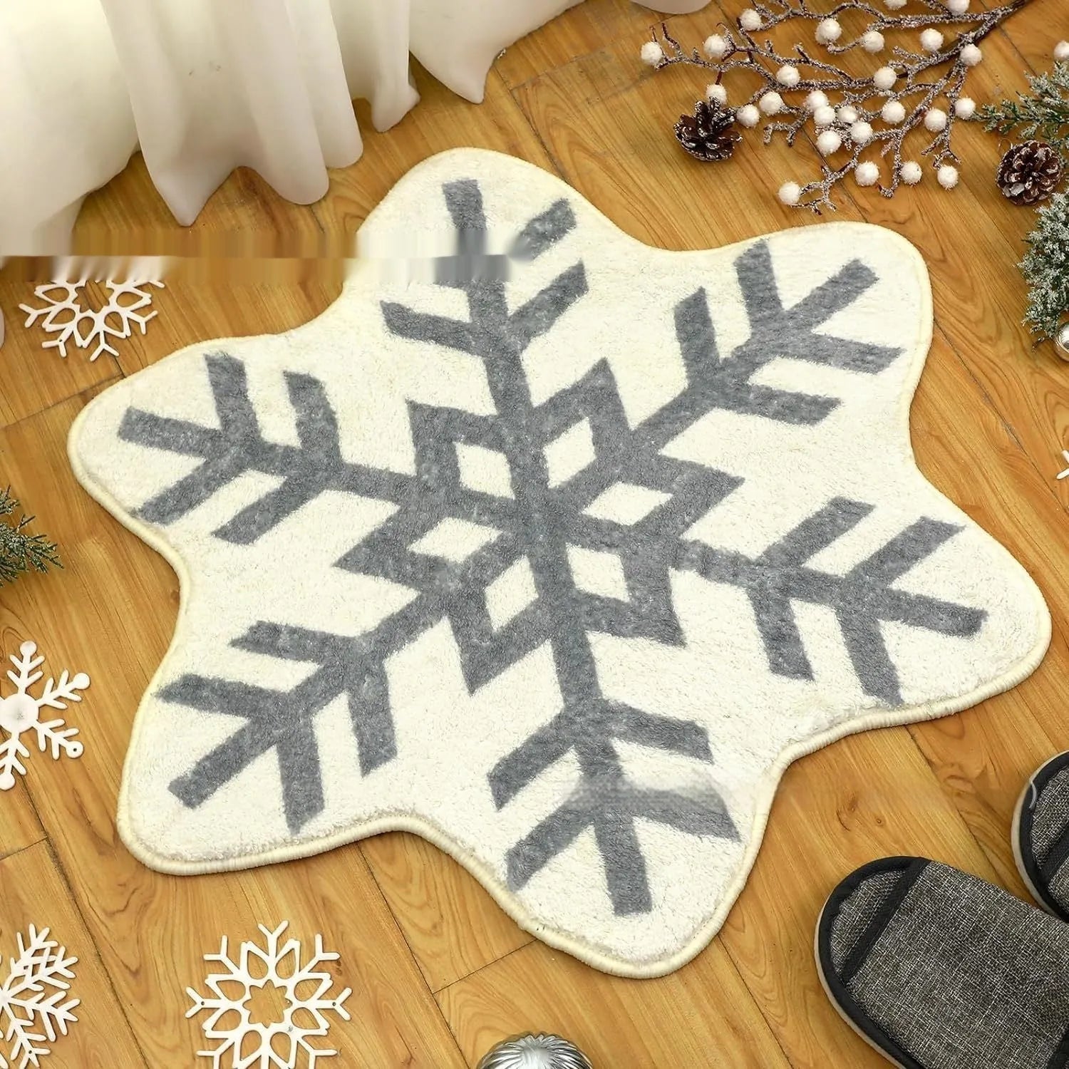 Christmas round pad polyester carpet mat in festive printed design on floor.