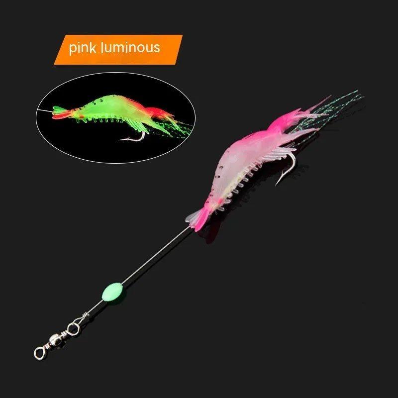 Six soft fishing lures with hooks in different colours including luminous and transparent variations