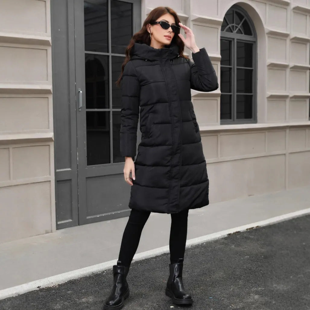 Black hooded slim fit winter jacket with regular sleeves on mannequin
