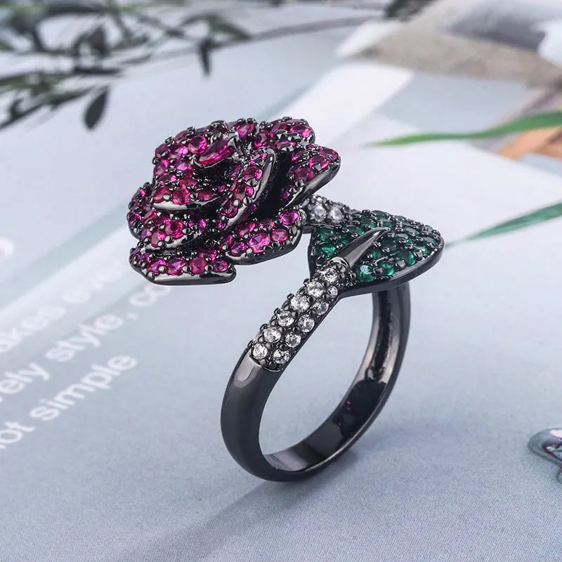 Black gold geometric flower ring with red simulation corundum stones