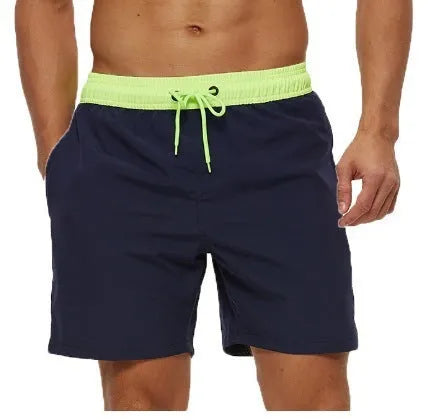 Men's blue running shorts with stitching waistband, zipper pocket, and drawstring for fitness activities