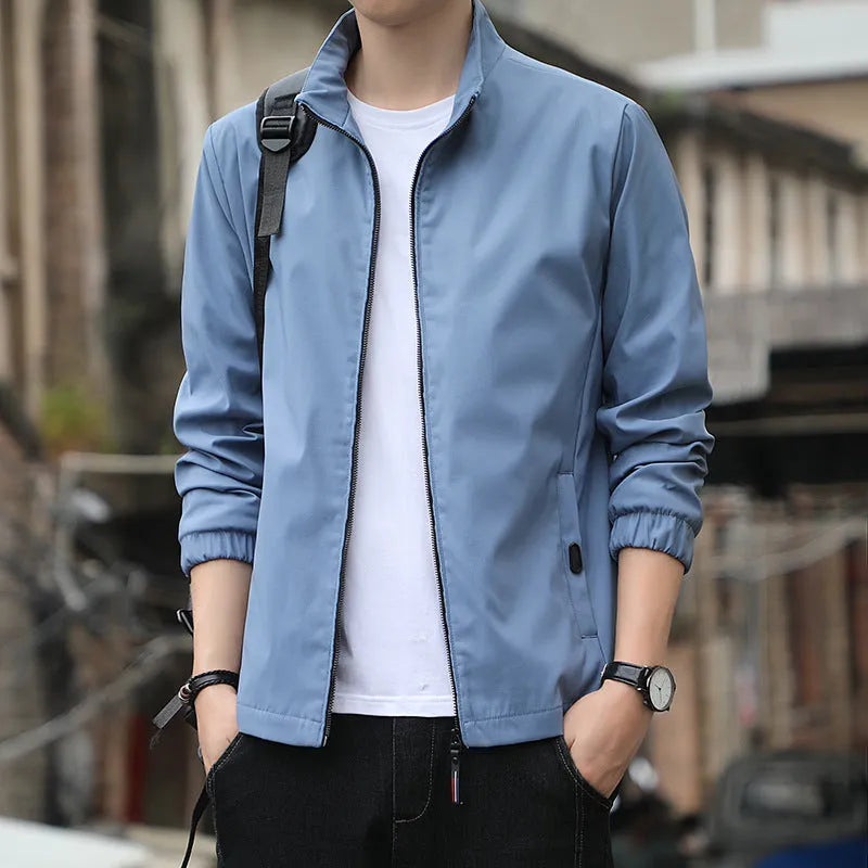 Korean-style men's loose lapel autumn jacket in a casual blue colour with zippered pockets.