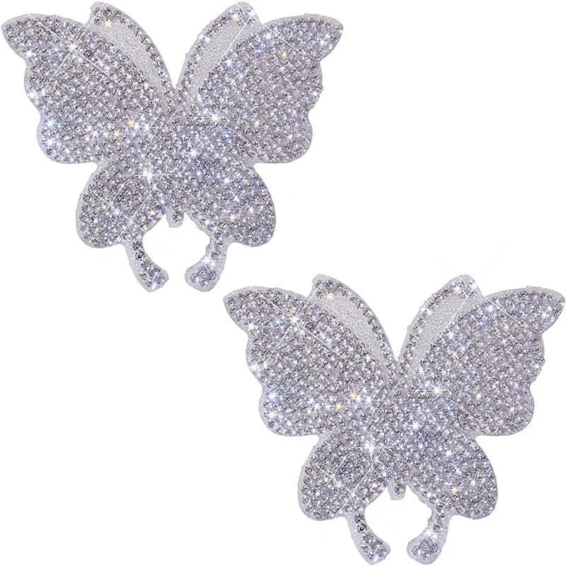 DIY glass car sticker with diamond-encrusted butterfly and bear paw design on white background