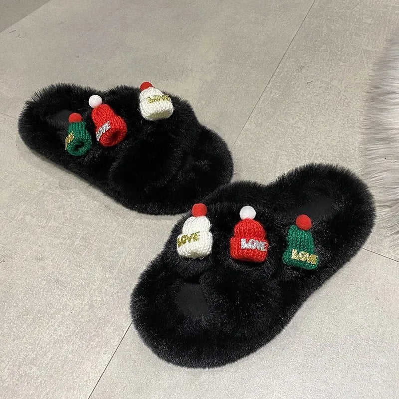 Women's black Christmas hat design faux plush slippers with a hairy texture and rubber sole.