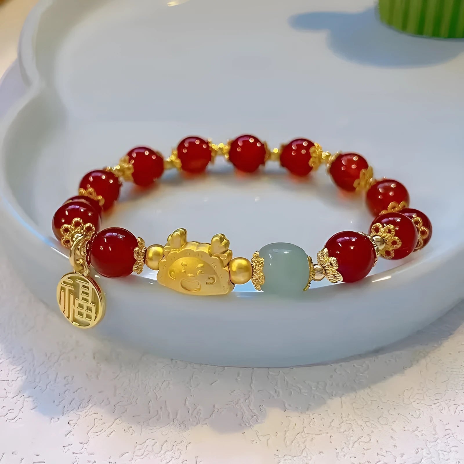 Women's floral glazed bracelet with zodiac animal charms and coloured glass beads