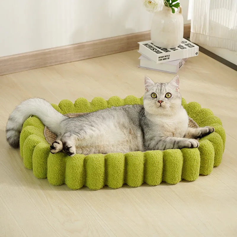 Green oval cat scratcher bowl bed with sisal scratching surface measuring 65cm