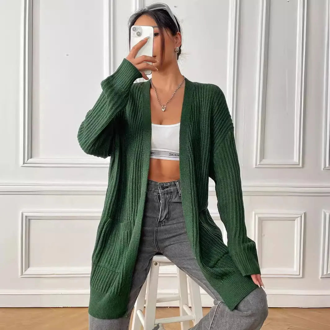 Women's double pocket casual cardigan sweater in dark green, loose mid-length fit.