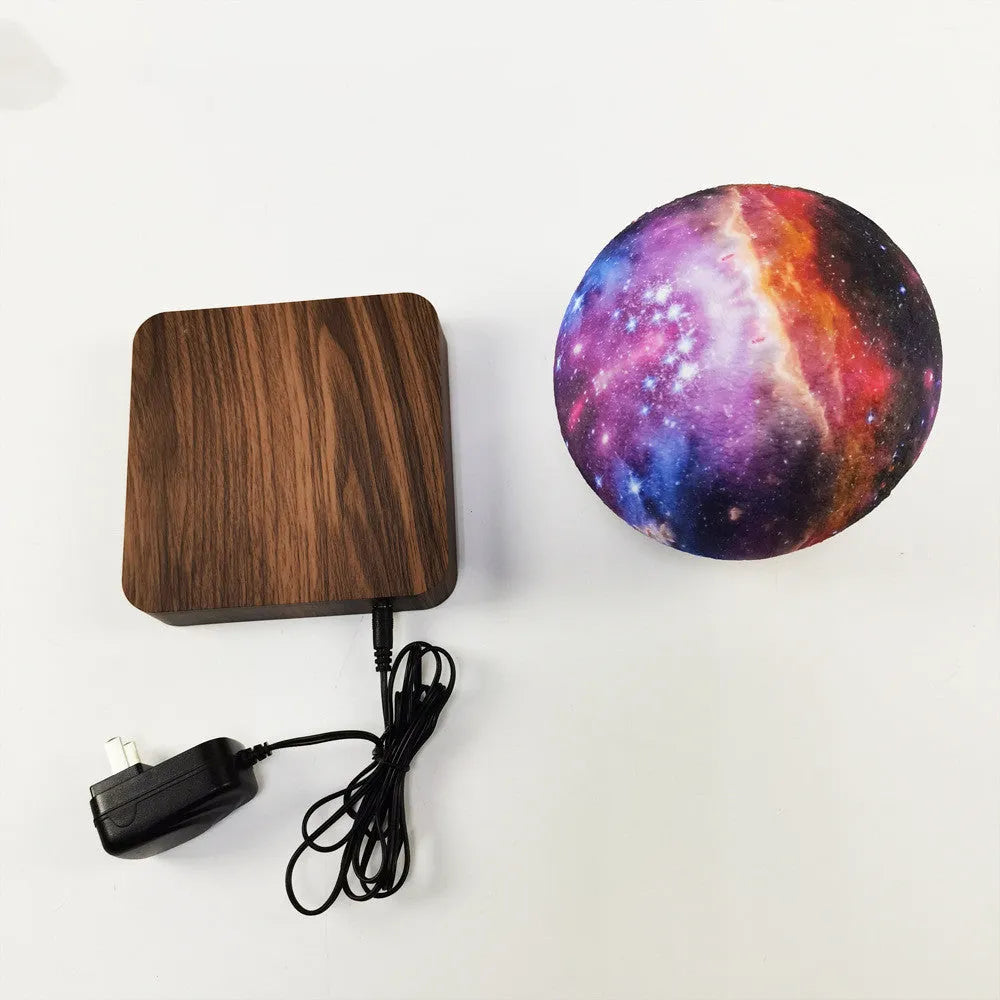 14cm magnetic levitation moon lamp floating above base with galaxy light effect