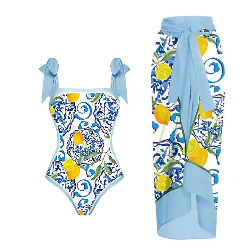 Women's retro floral one-piece swimsuit with chiffon skirt in yellow and black feather patterns