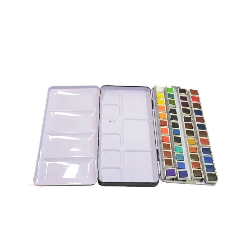 Square tinplate three-fold paint box for solid watercolours, shown open with empty slots.