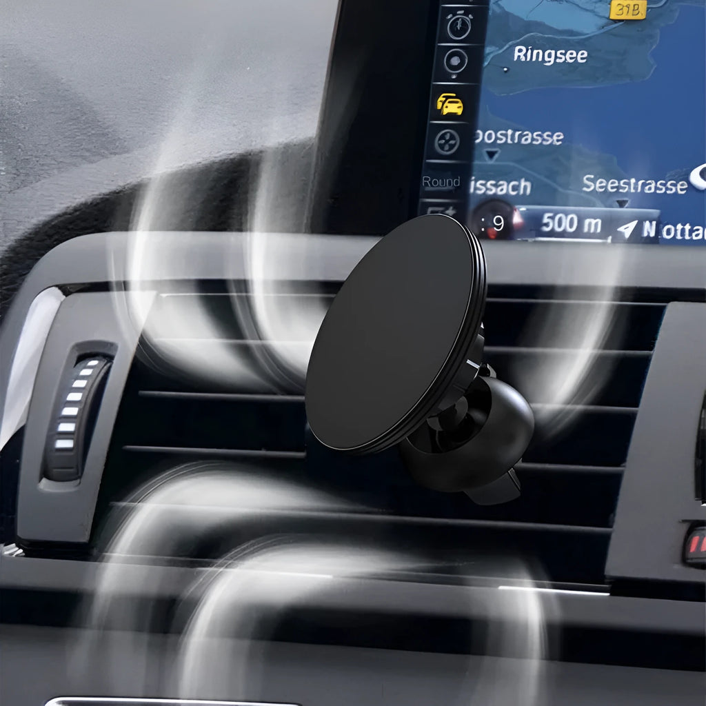 Black aluminium alloy magnetic suction car phone holder mounted on a car air vent