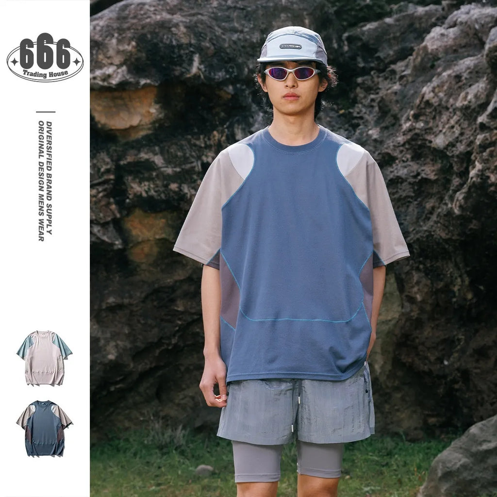 Men's loose-fit patchwork contrast colour T-shirt with raglan short sleeves in cotton blend fabric.