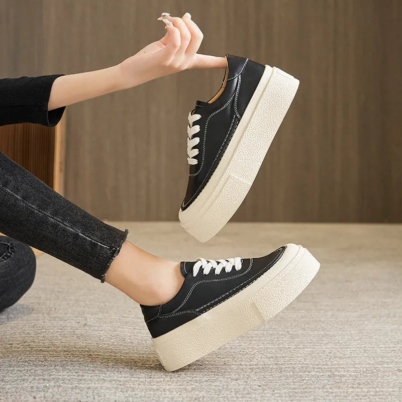 Women's black platform casual sports shoes with embossed cowhide upper and round toe design