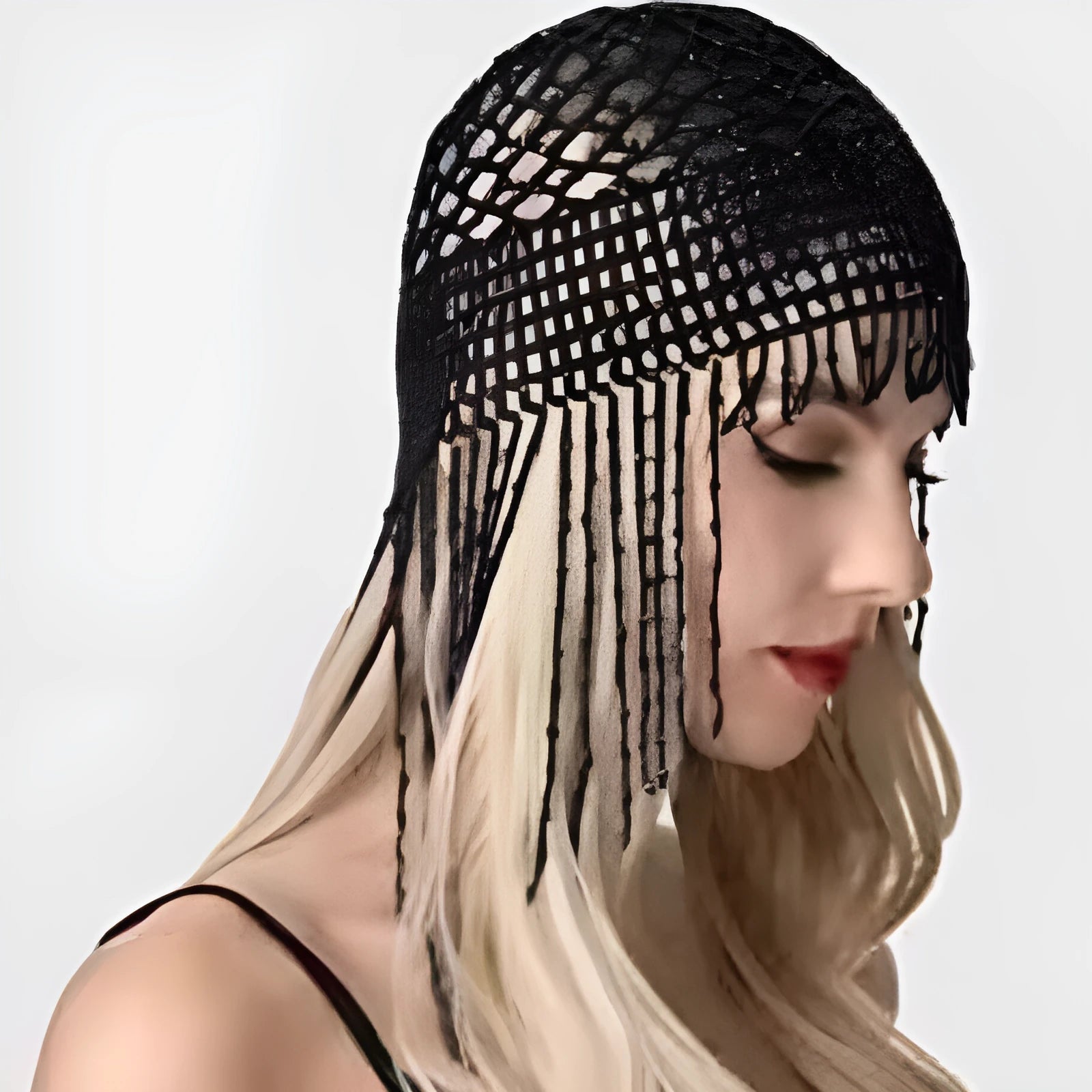 Handmade silver belly dance hat with beaded alloy tile and long black tassels.