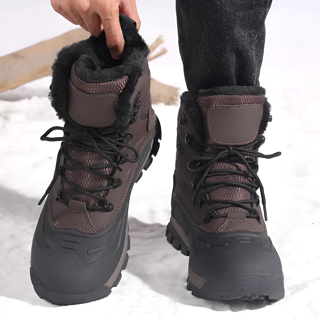 Men's black high-top boots with fleece lining and lace-up front on a ribbed sole.
