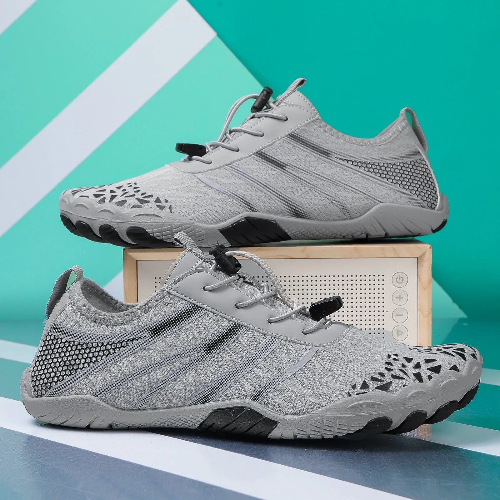Pair of casual unisex running shoes with Lycra stretch fabric upper, shown in beige colour.