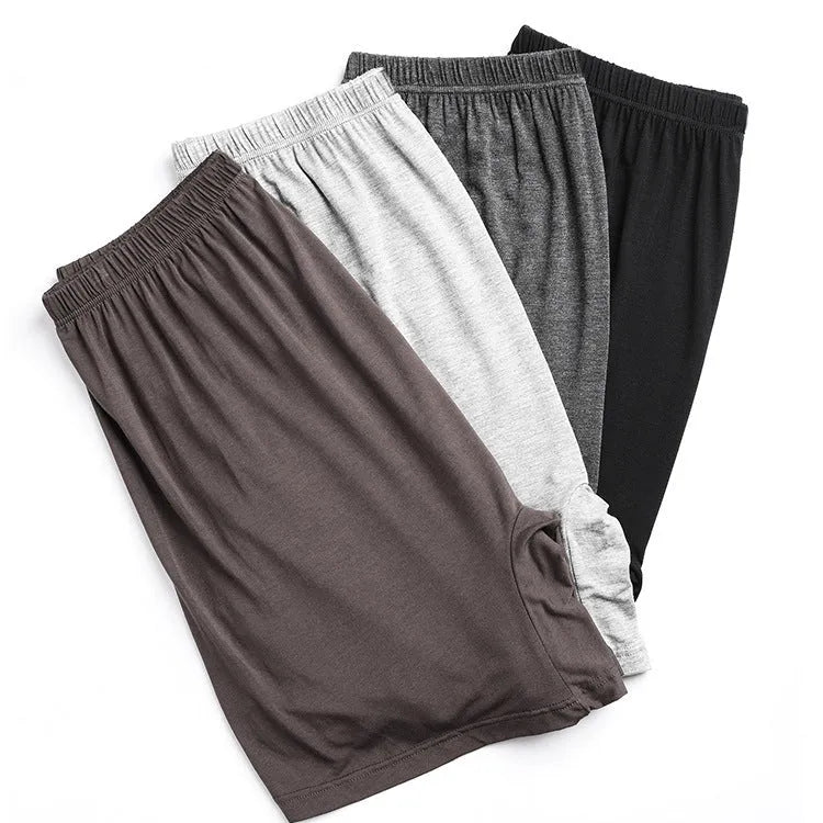 Men's solid colour high-waist boxer shorts in modal fabric showing black, blue, grey and brown colour options