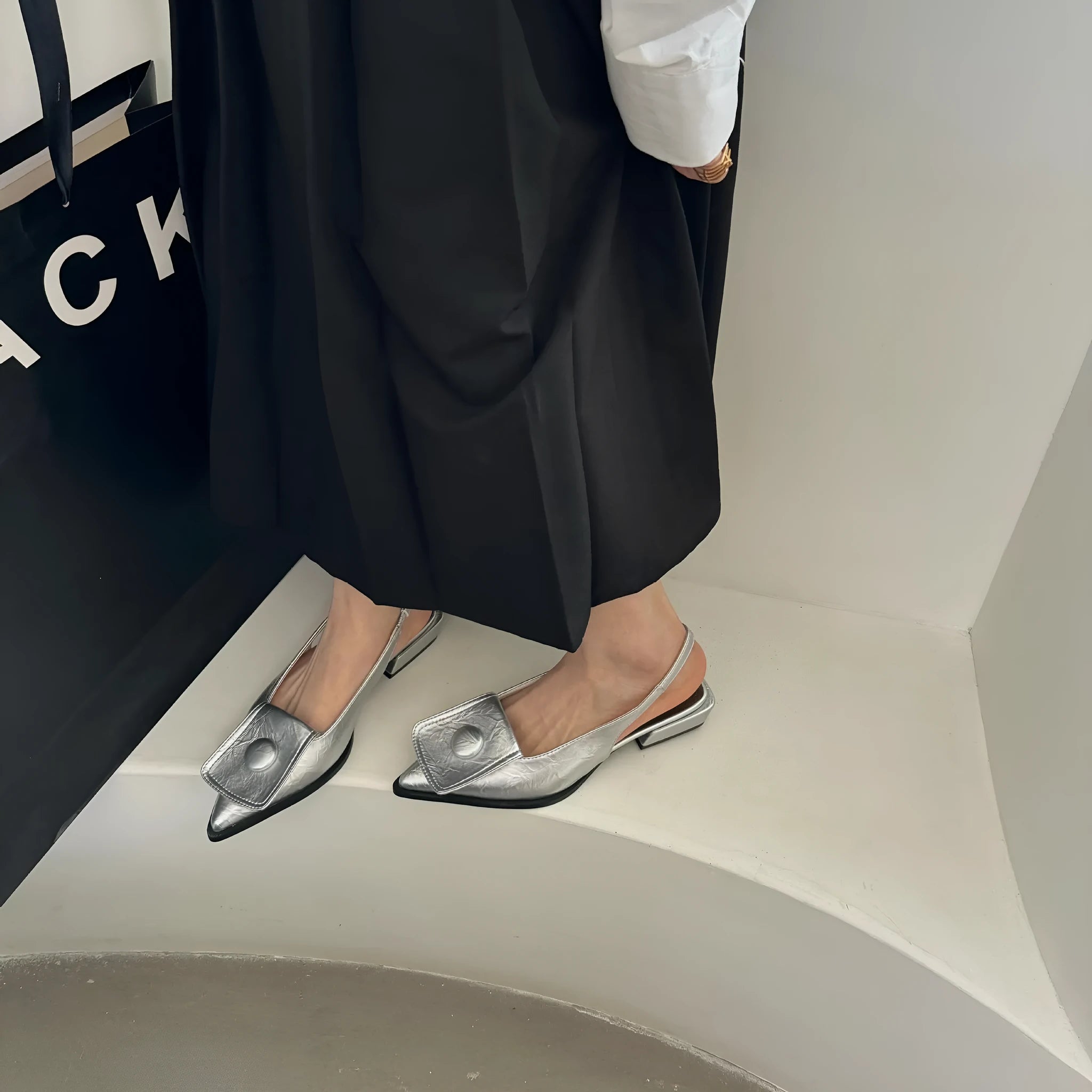 Women's low heel pointed toe sandals with back strap in apricot colour