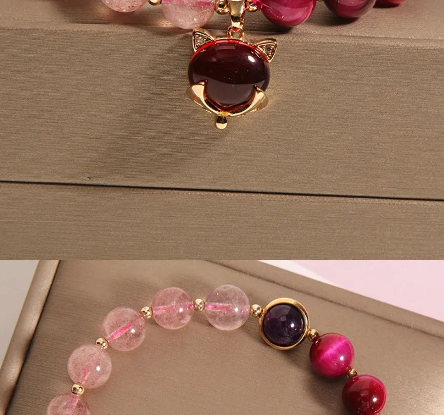 Simple strawberry crystal bracelet for women on a black elastic rope, 18cm long.