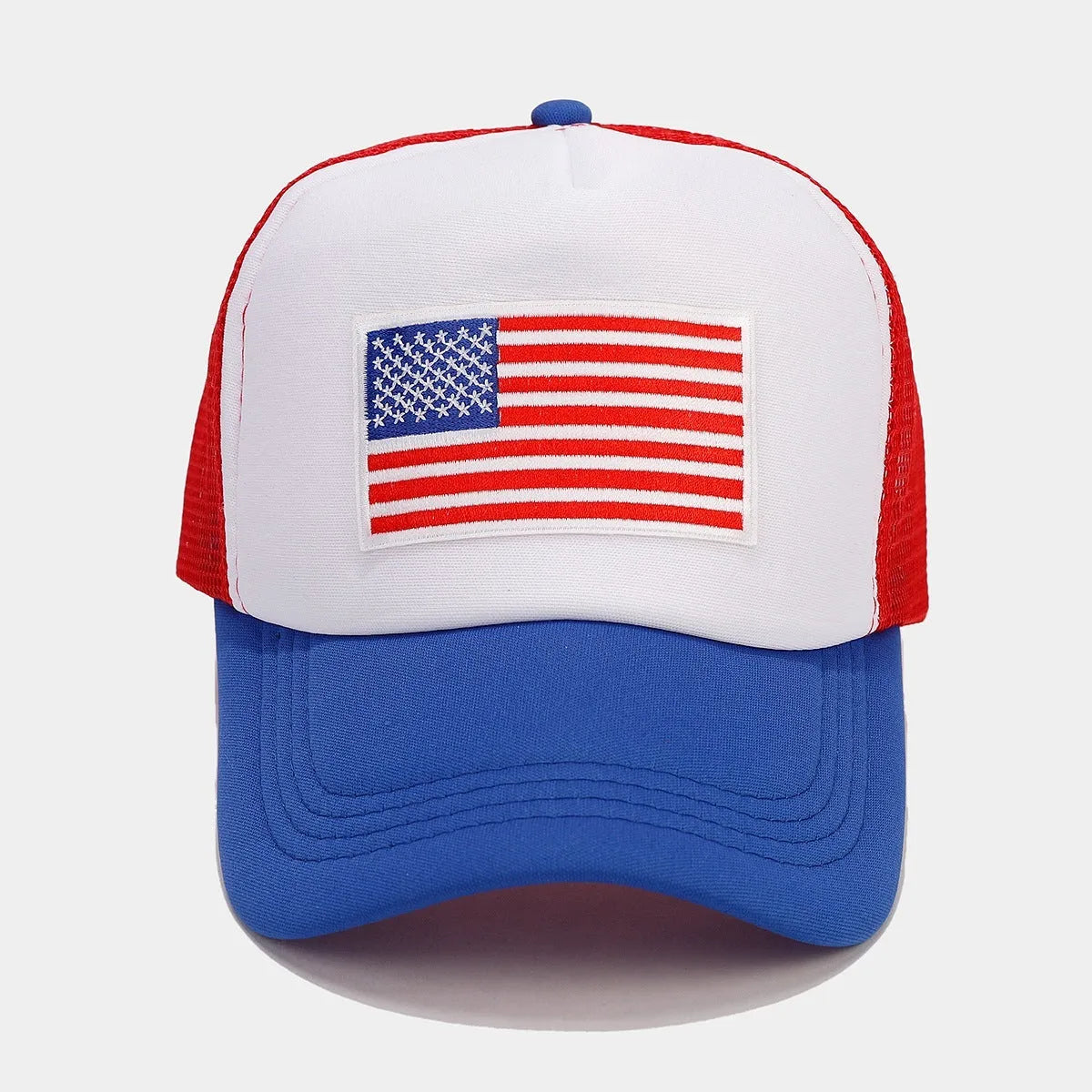 Red and blue contrasting mesh baseball cap with adjustable strap on a dome crown.