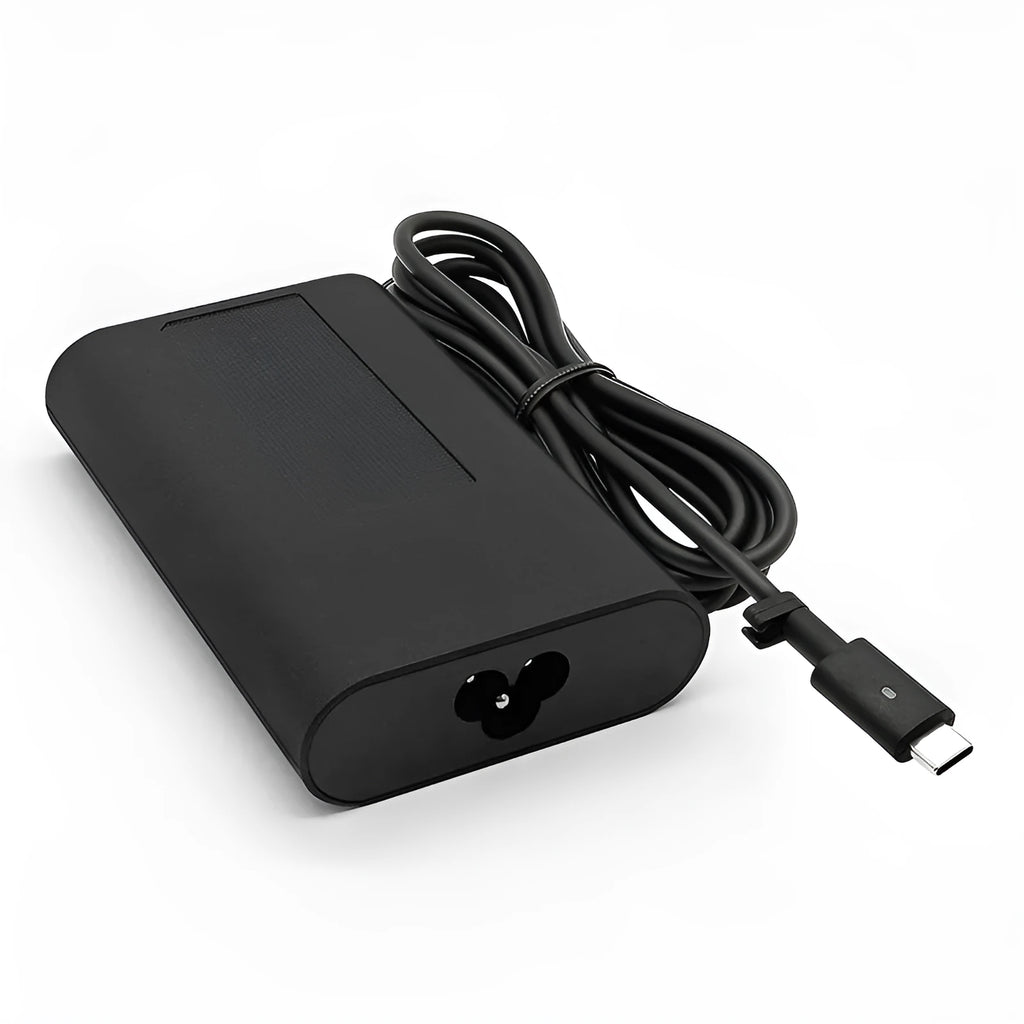 Black oval 65W USB-C laptop power adapter with Type-C port and multiple international power cords