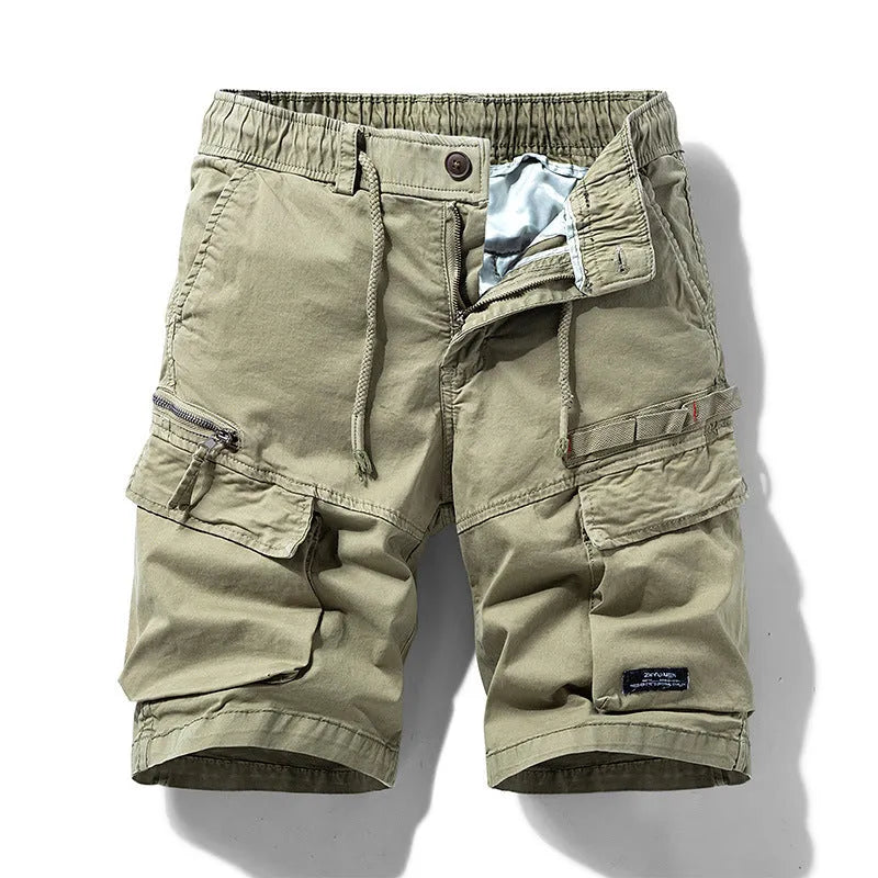Men's army green cotton shorts with a zip fly and multiple pockets, shown in a Korean-style fifth pants length.