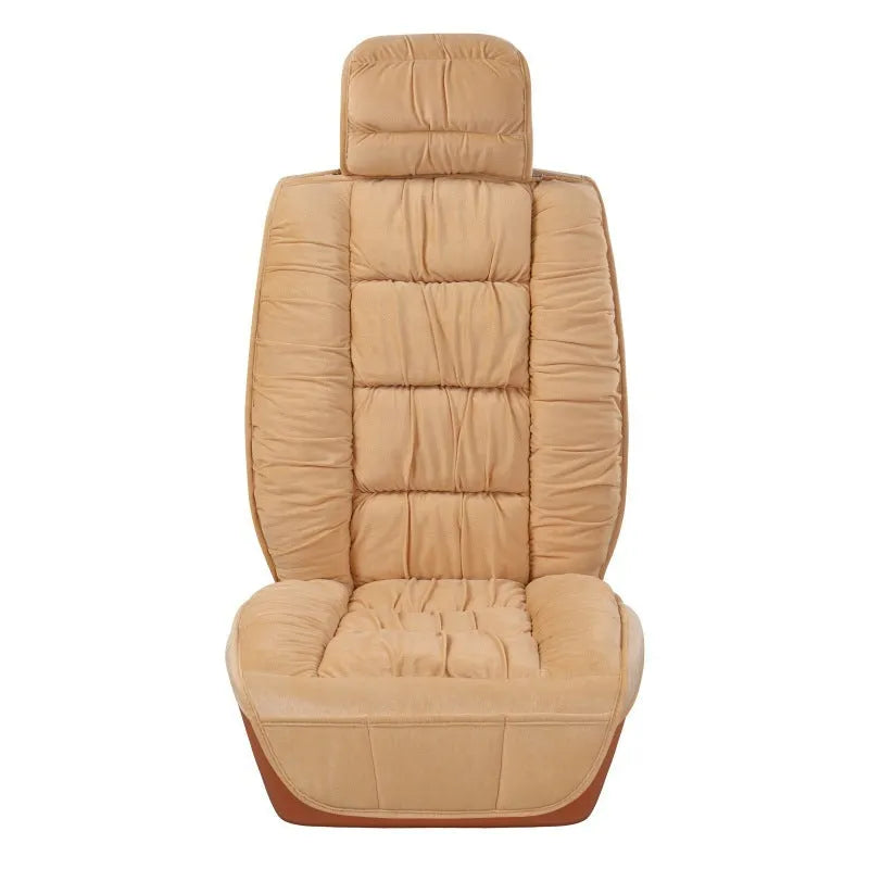 Short plush car seat cushion in charcoal grey on vehicle seat
