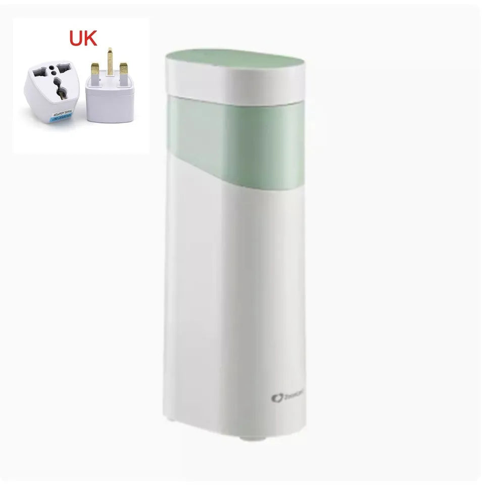 Black or green small instant water dispenser with digital display on a desktop.