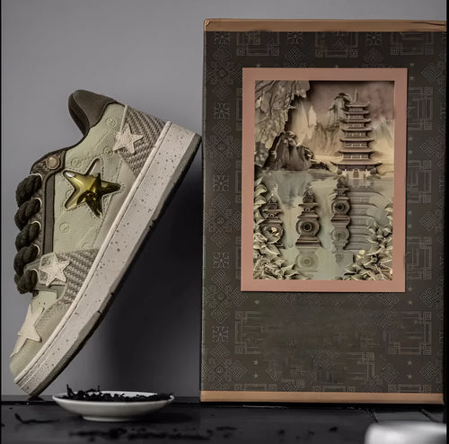 Green low-top casual trainers with star pattern stitching and a white rubber sole.
